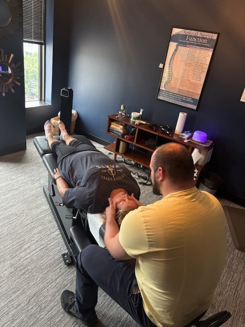 IMG_3396 patient with neck pain in dallas getting treatment from dallas chiropractor